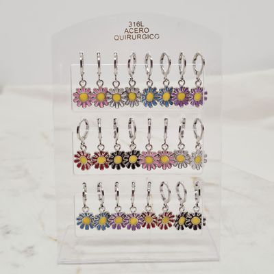 BLISTER DE ARGOLLAS BRISURA CON MARGARITAS DE COLORES - Imagen 1
