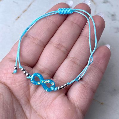PULSERA DE HILO REGULABLE - INFINITO CELESTE - Imagen 1
