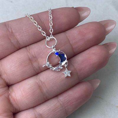 COLLAR ACERO BLANCO - LUNA CRISTAL TORNASOL CON ESTRELLA COLGANTE - Imagen 1