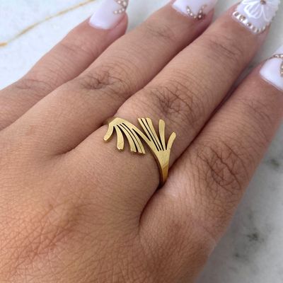 ANILLO ACERO DORADO DOBLE HOJA CHICA - Imagen 1