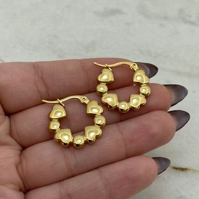 ARGOLLA ACERO DORADO MACIZA - CORAZONES Y CIRCULOS - Imagen 1
