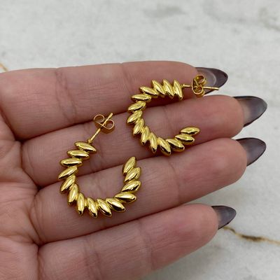 AROS ACERO DORADO MACIZO PASANTE CON GOTITAS - Imagen 1