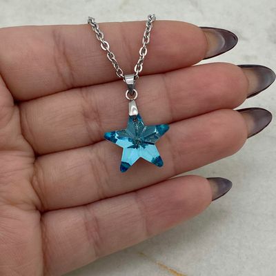 COLLAR CON DIJE CRISTAL - ESTRELLA CELESTE - Imagen 1
