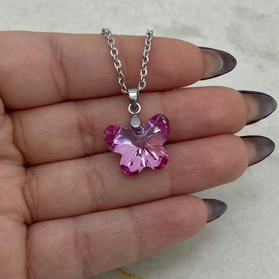 COLLAR CON DIJE CRISTAL - MARIPOSA ROSA - Imagen 1