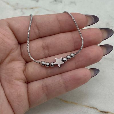 COLLAR COLITA DE RATA CON ESTRELLA PASANTE Y BOLITAS - Imagen 1