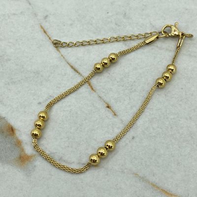PULSERA ACERO DORADO ENTRAMADA CON TRIPLE BOLITA - Imagen 1