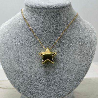 COLLAR ACERO DORADO ESTRELLA INFLADA PASANTE - Imagen 1