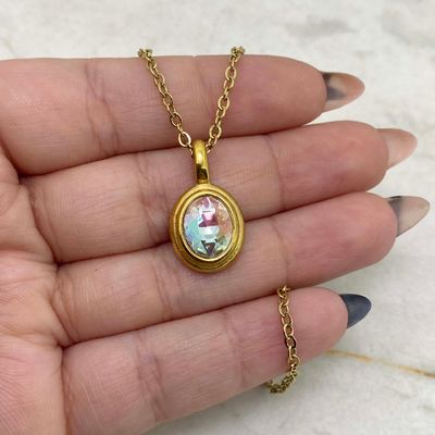 COLLAR ACERO DORADO DIJE OVALADO MACIZO CON CRISTAL -  TORNASOL CLARO - Imagen 1
