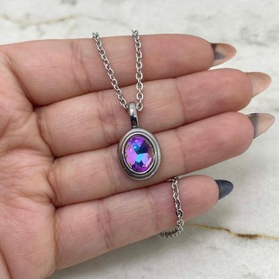 COLLAR DIJE OVALADO MACIZO CON CRISTAL - TORNASOL VIOLETA - Imagen 1
